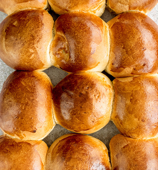Golden pull-apart dinner rolls.