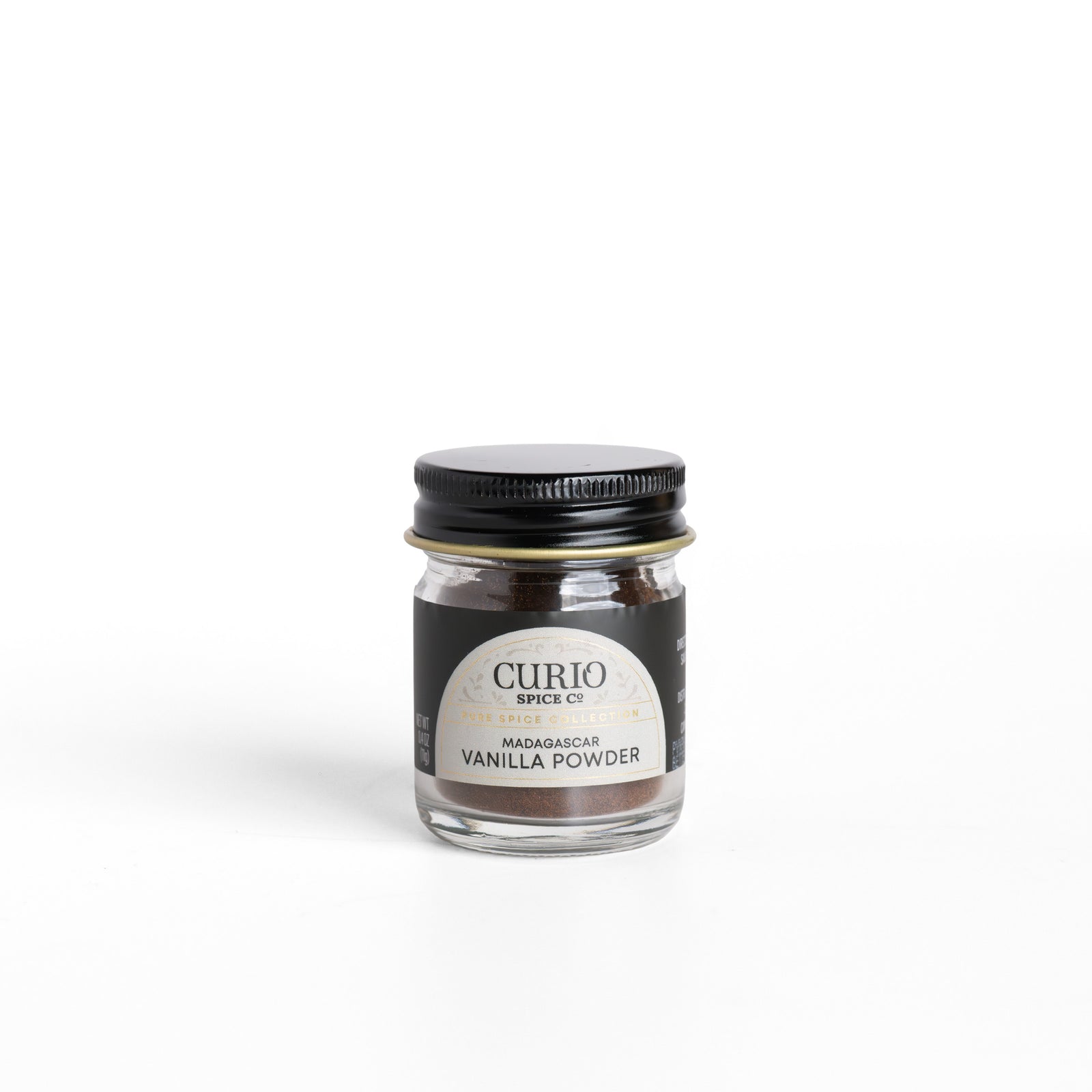 Curio Spice Co. pure Madagascar Vanilla Powder in a glass jar.