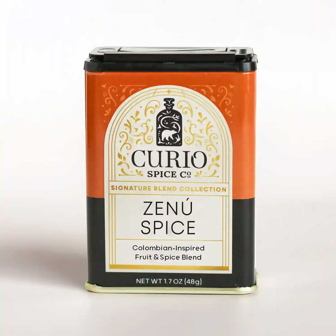 Orange and black tin of Zenú Spice, a Colombian-Inspired Fruit &amp; Spice Blend from Curio&