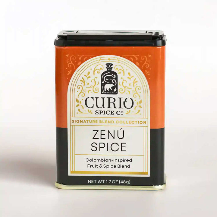 Orange and black tin of Zenú Spice, a Colombian-Inspired Fruit &amp; Spice Blend from Curio&