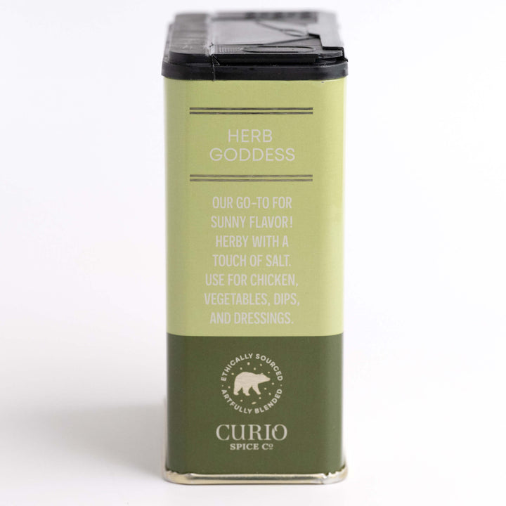 Green spice container labeled &