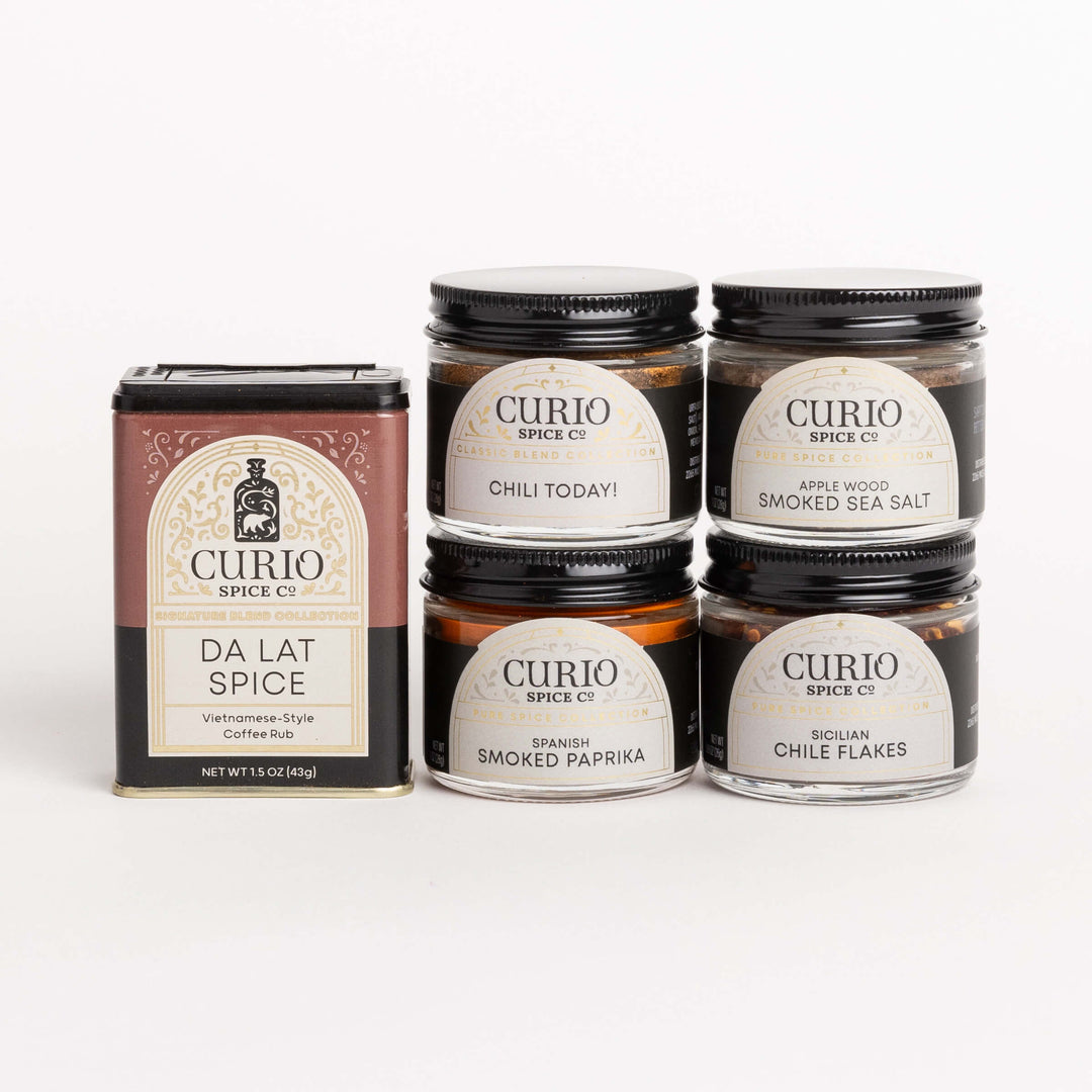 Curio Spice Co. Smoke And Grill gift set featuring the Da Lat Spice Signature Blend, Chili Today! Classic Blend, and and fair-trade single origin sustainable spices.