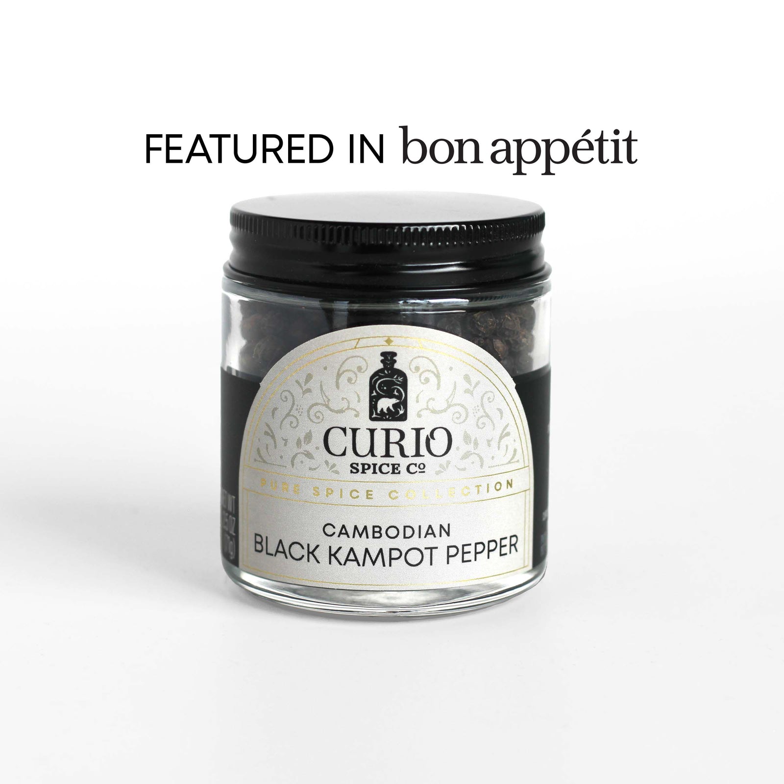 Curio Spice Co. fair-trade single origin sustainable Cambodian Black Kampot Pepper in a glass jar, as featured in Bon Appetit.