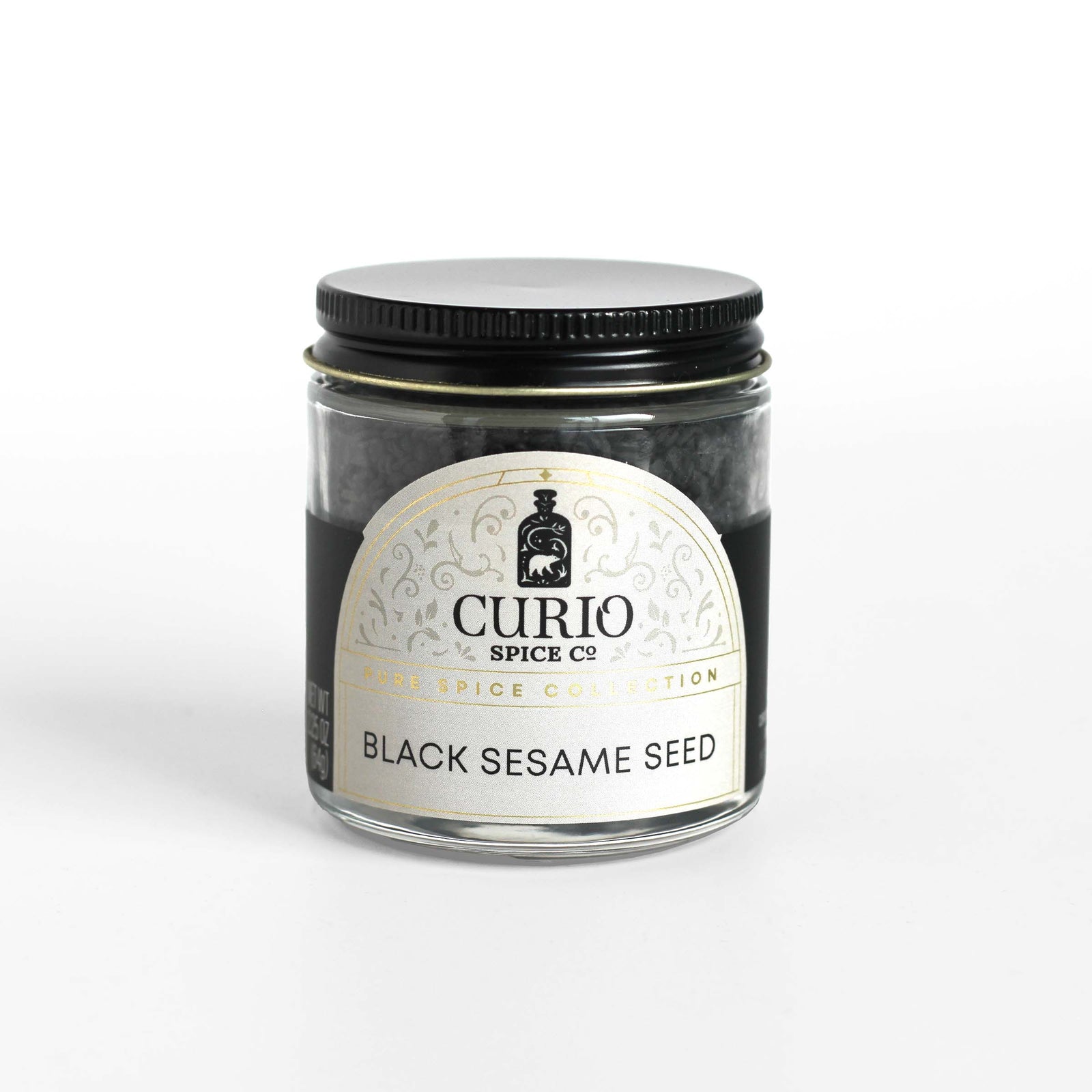 Curio Spice Co. fair-trade single origin sustainable black sesame seeds in a glass jar.