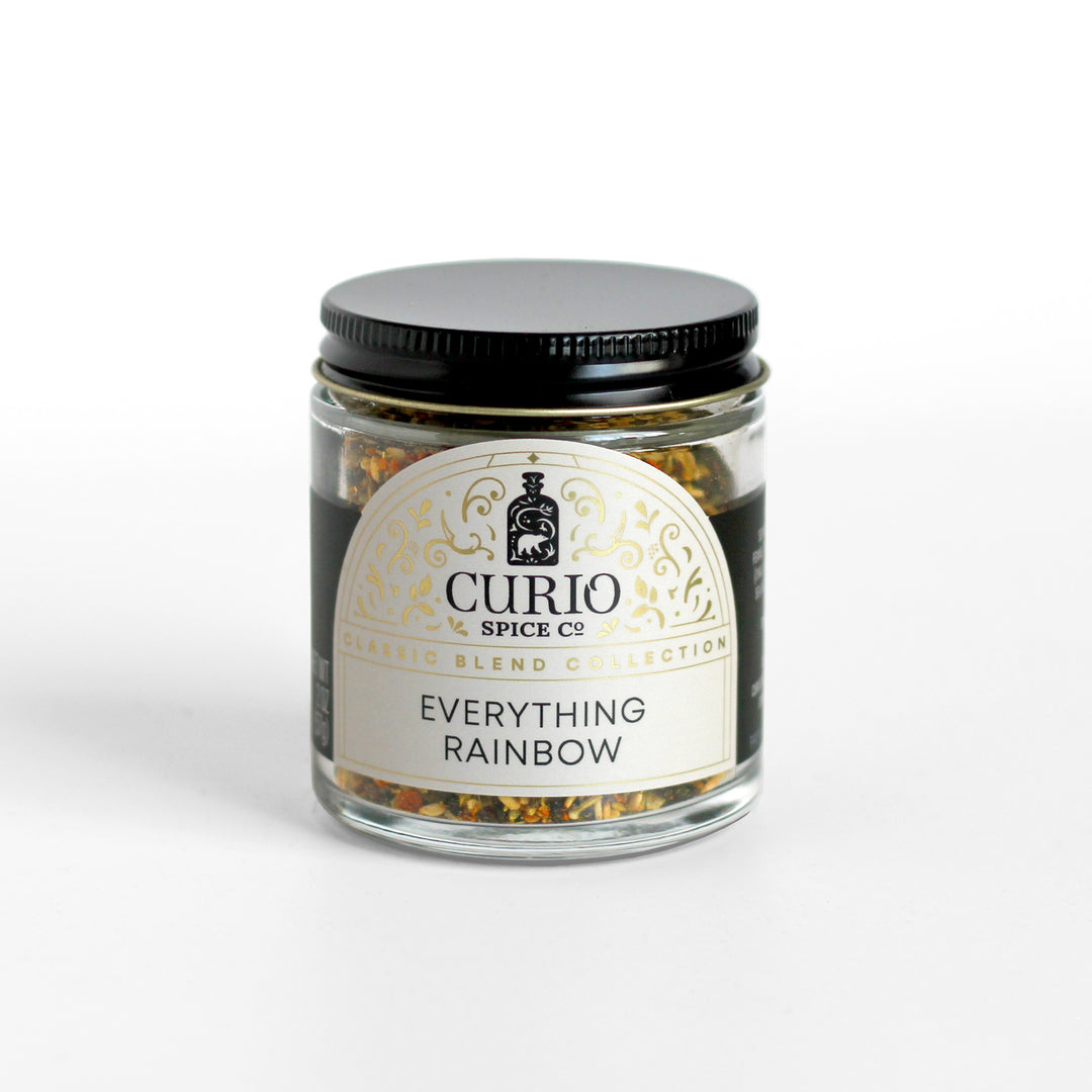 Curio Spice Co. Classic Blend Everything Rainbow in a glass jar.